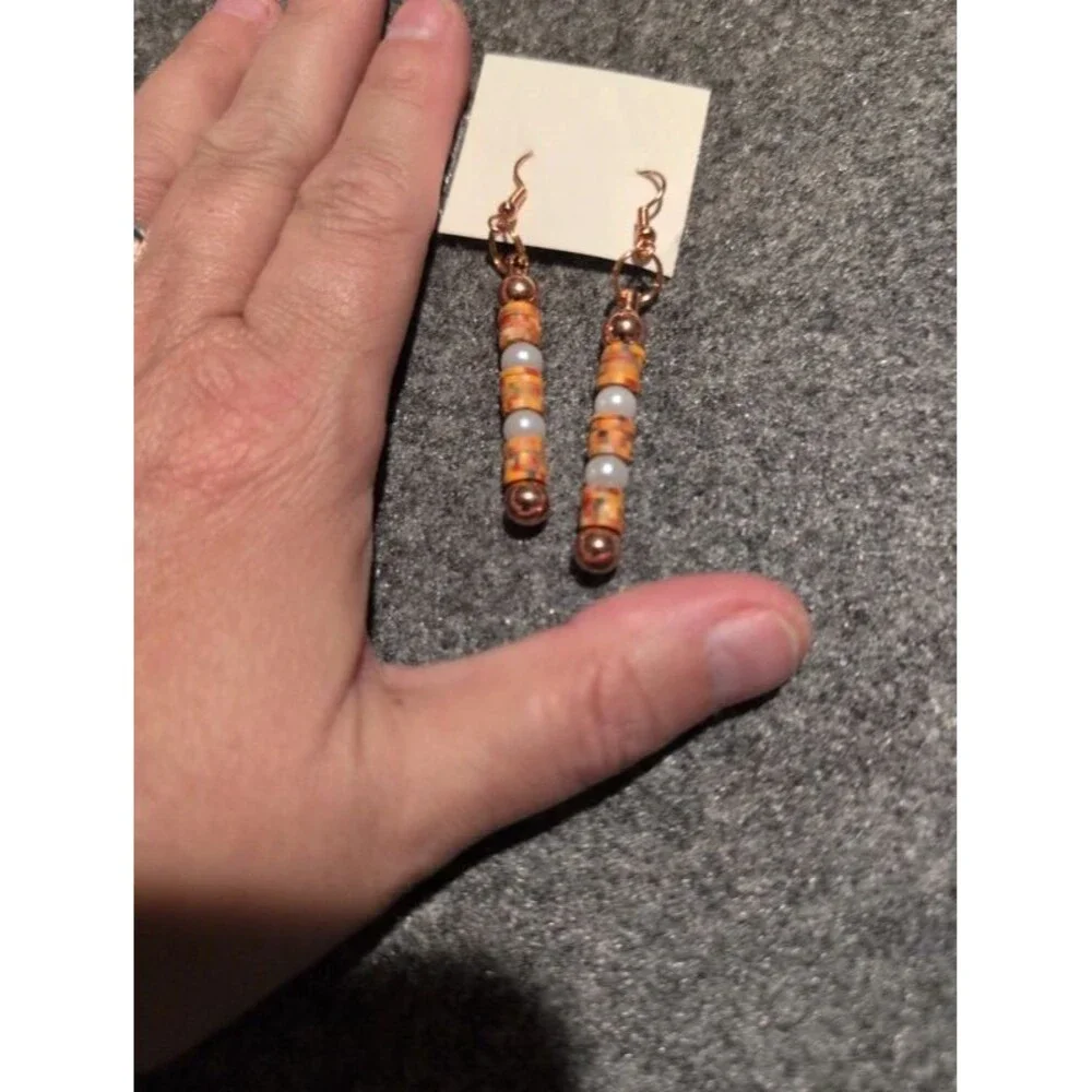 Orange and pearl beaded dangle earrings